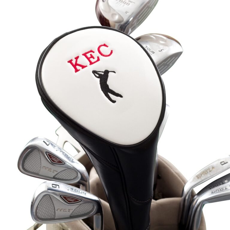 Golf clubs in a bag with a personalized head cover