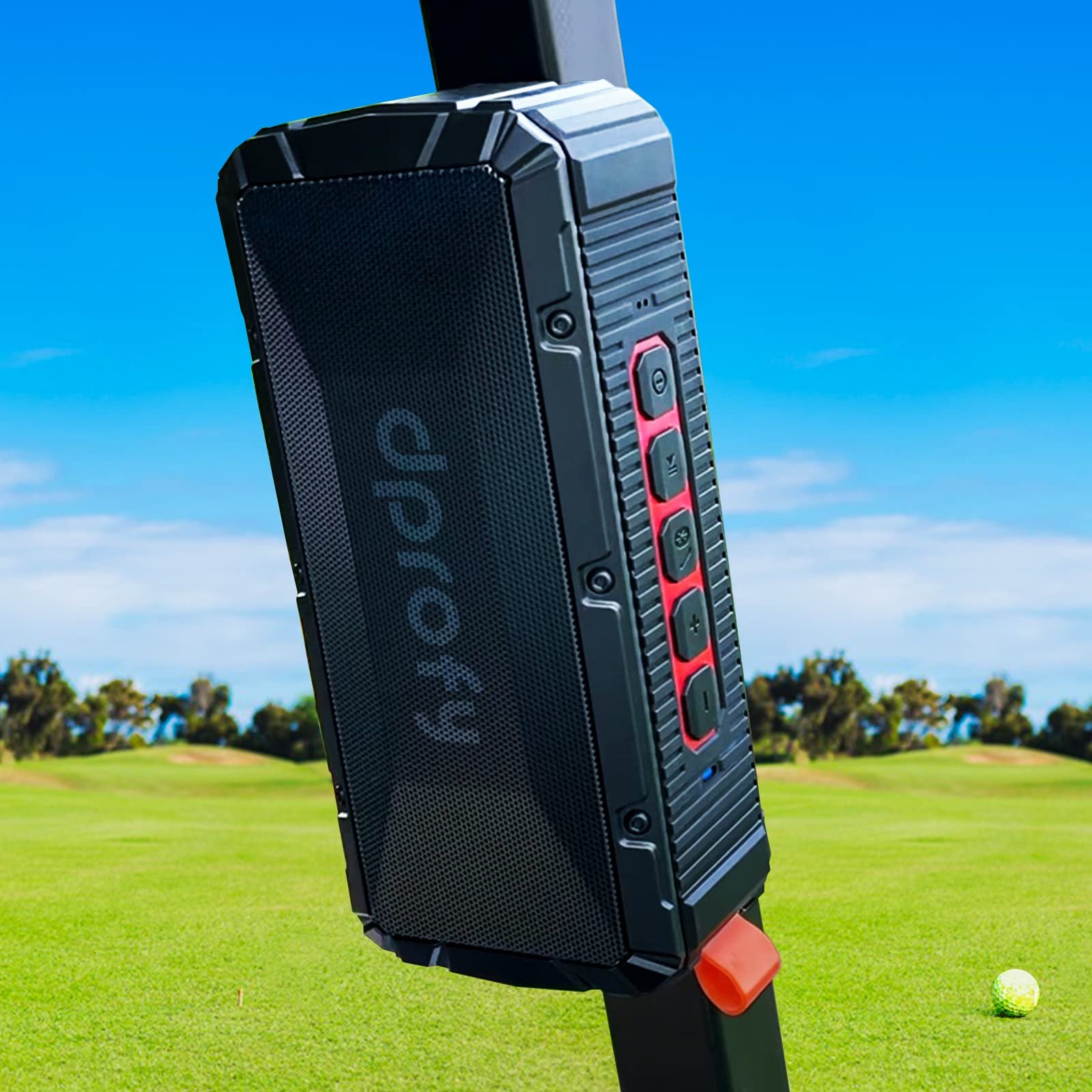 Black and red speaker mounted on a golf cart, green golf course background