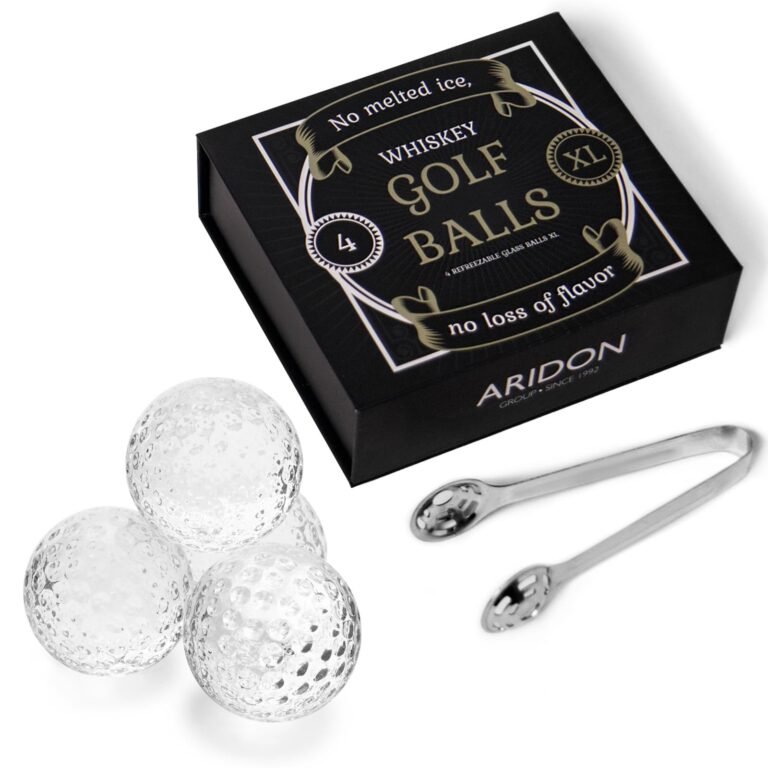 Whiskey golf ball ice cubes with tongs and box on white background