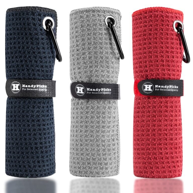 Three rolled golf towels in navy, gray, and red with carabiner clips