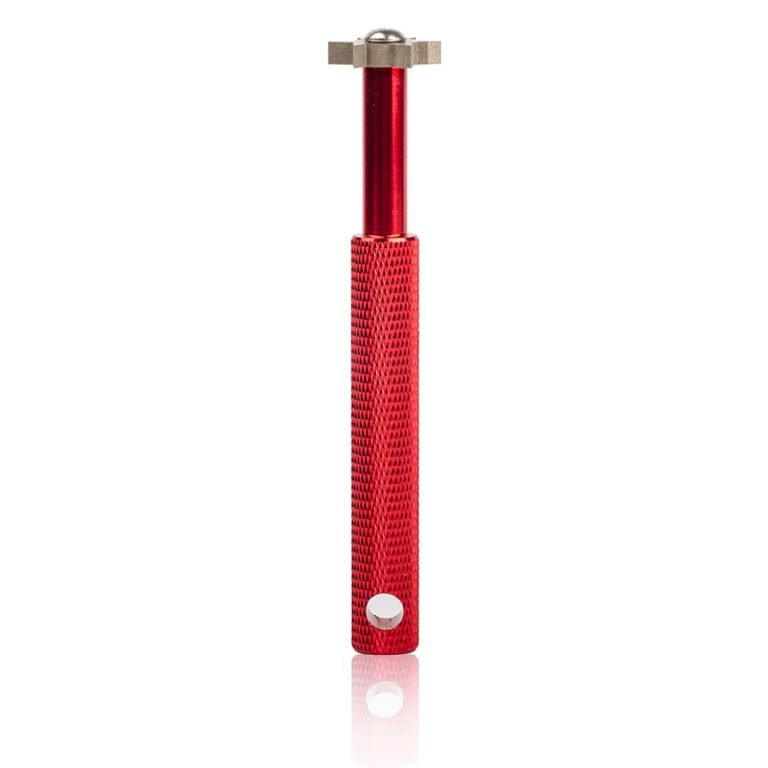 Red golf club groove cleaner tool with a textured handle