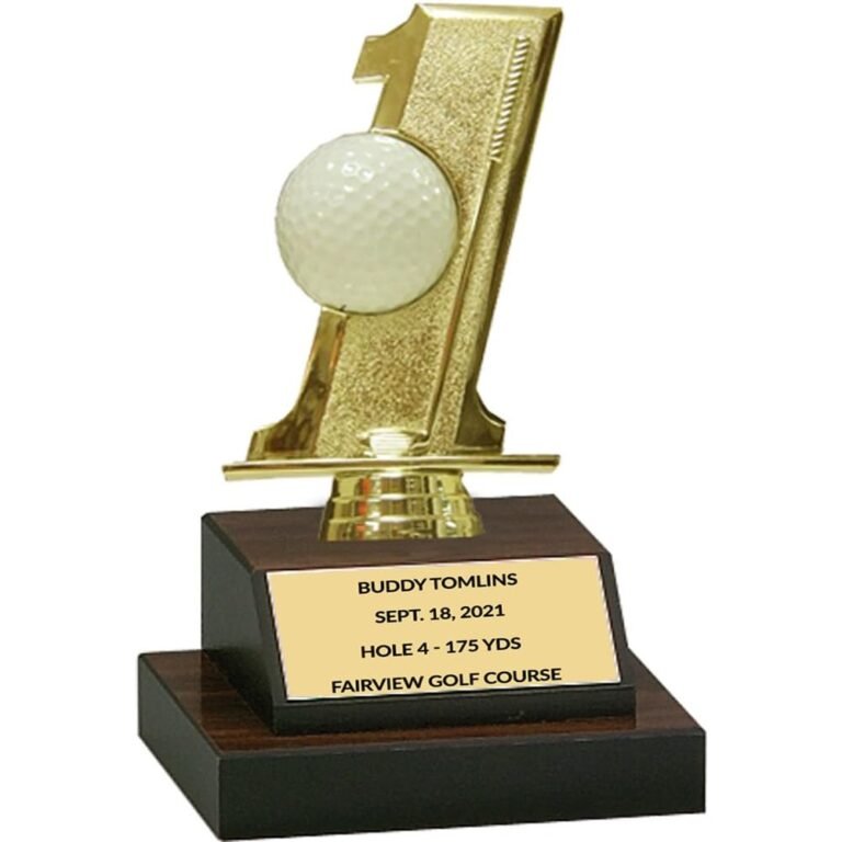 Gold golf trophy with a golf ball and inscription on the base