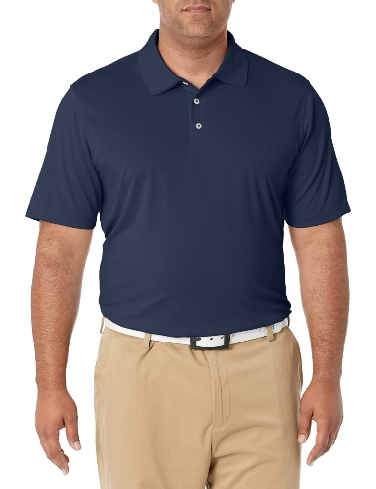 Man wearing a navy polo shirt, khaki pants, and a white belt